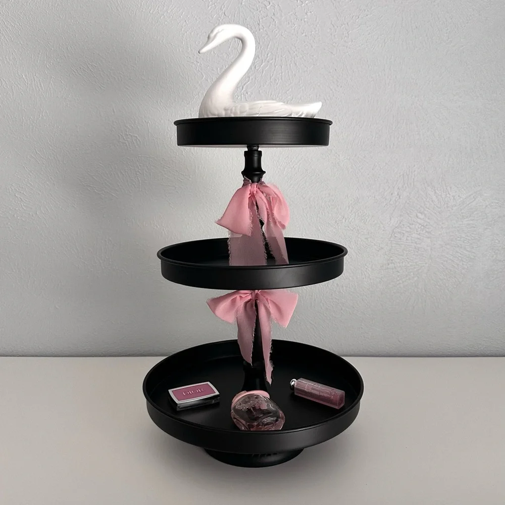 Black Three-Tiered Stand with Pink Silk Bow Accents